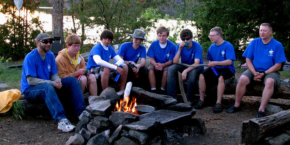 Scouts around a campfire -camping for Scout troups